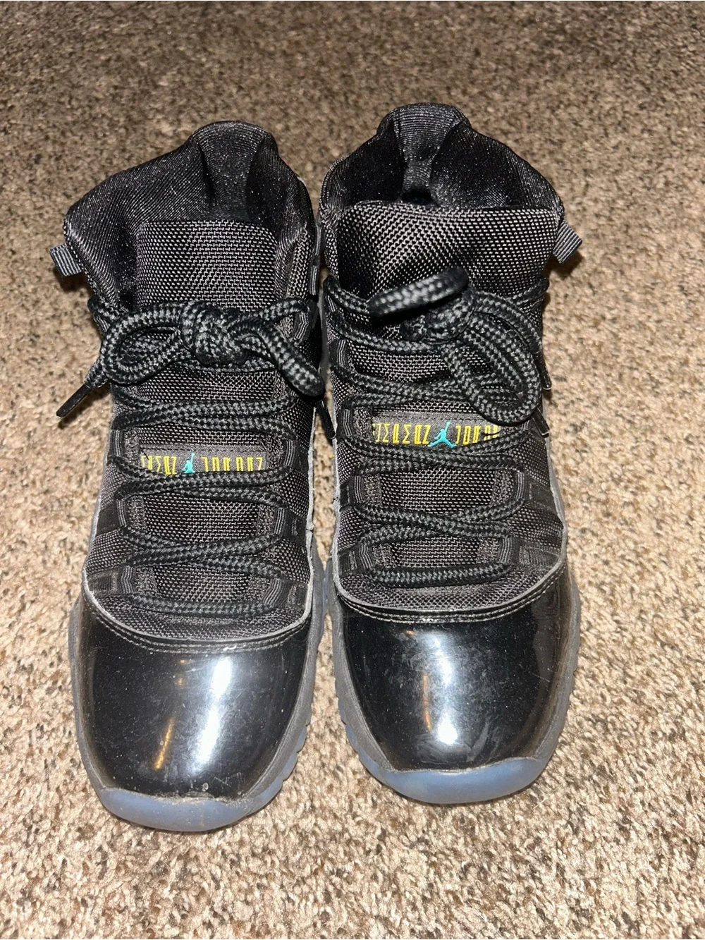 Jordan Men’s High-Top Sneakers in Black with Teal Accent